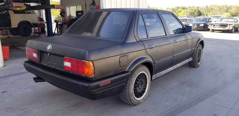 Illustration for article titled At $4,800, Could This Rhino-Lined 1991 BMW 325iX Release Your Inner Beast?